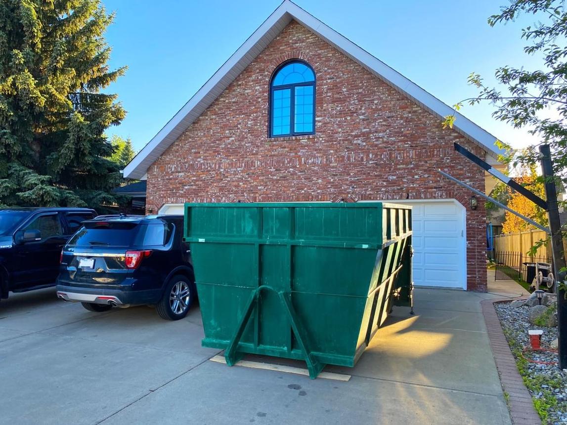 Dumpster bin rental in residential area in Calgary and surrounding communities