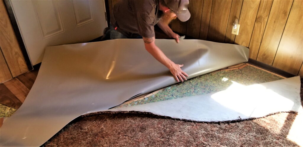 man-installing-new-flooring-in-a-home-2026-07-15-21-36-25-utc (1)