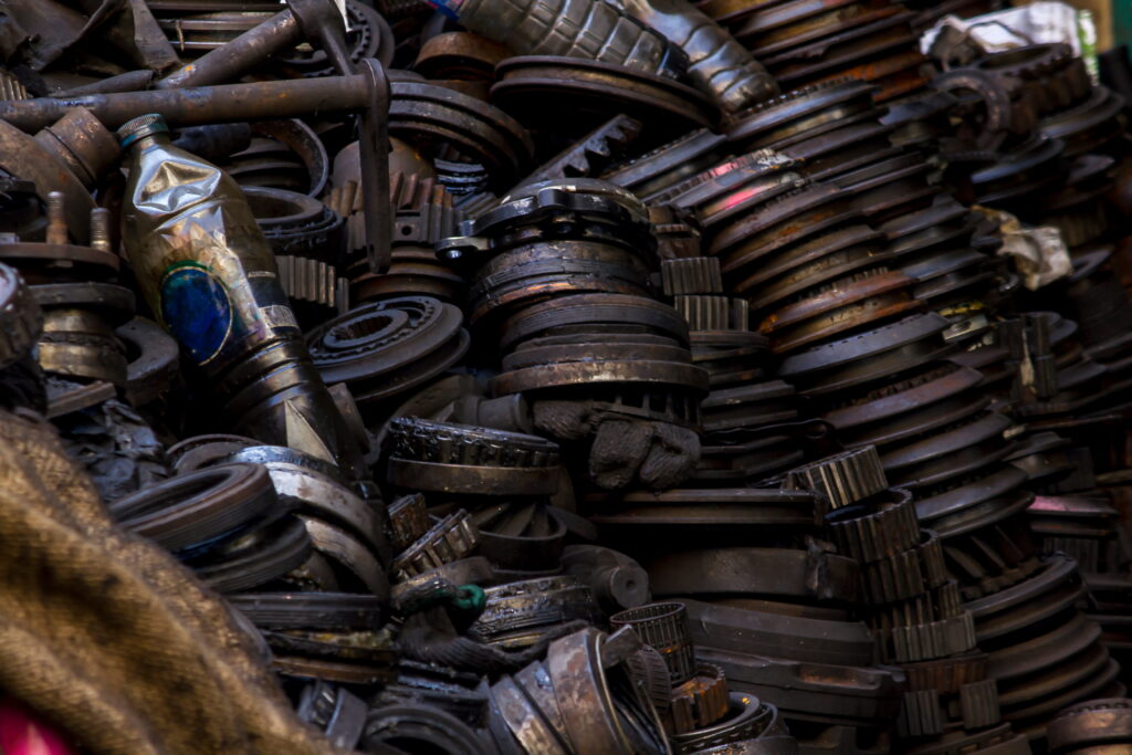 pile-of-used-auto-parts-in-junkyard-2026-09-21-21-24-49-utc (1)