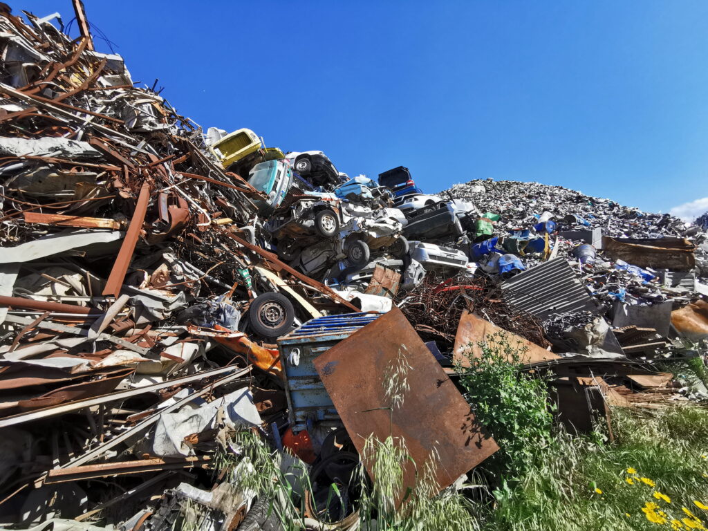 scrap-metal-and-cars-at-an-industrial-junkyard-2026-09-21-23-24-39-utc (1)